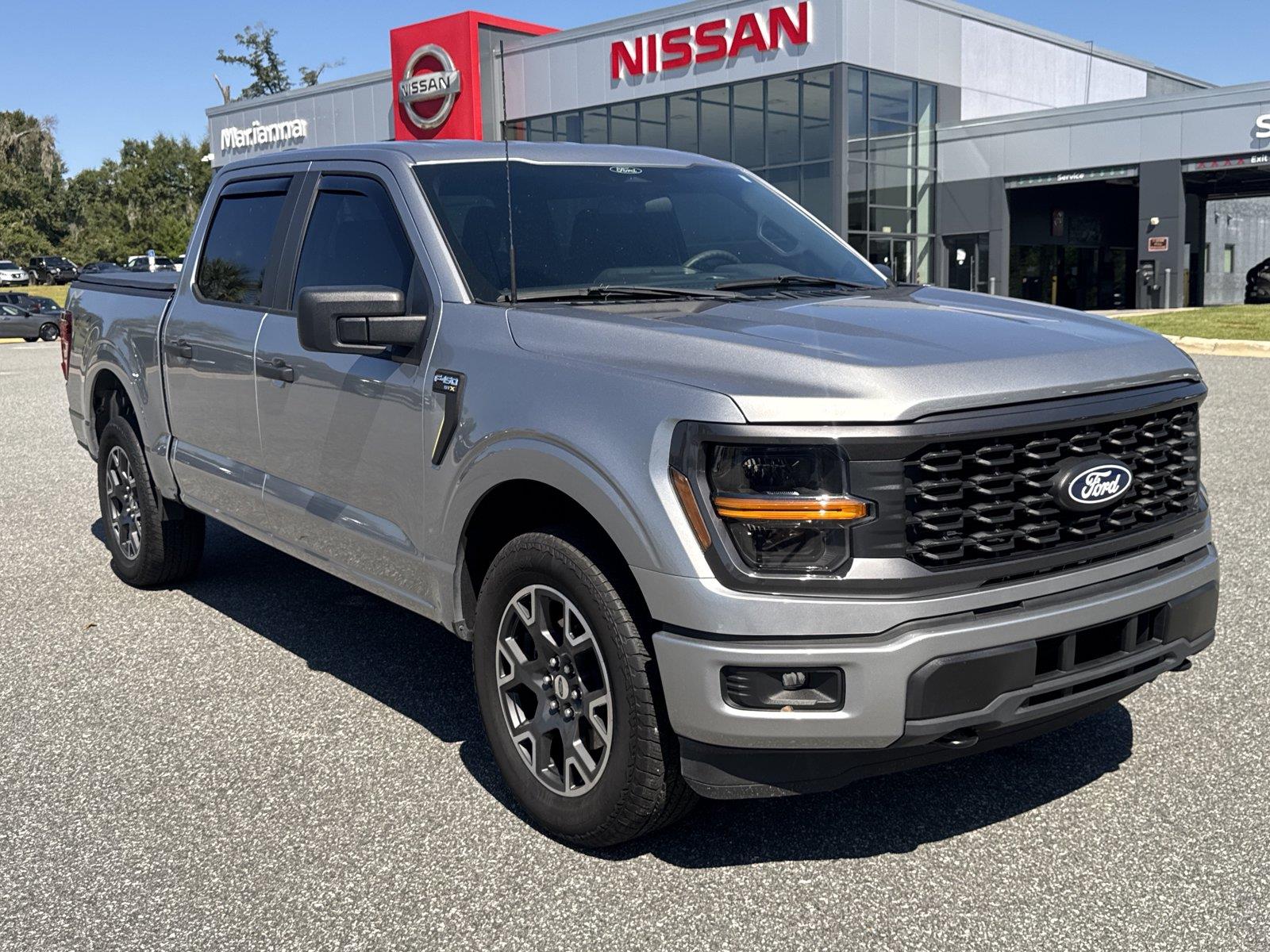 Iconic Silver 2025 Ford F-150 Pickup Truck Four-Wheel Drive Automatic