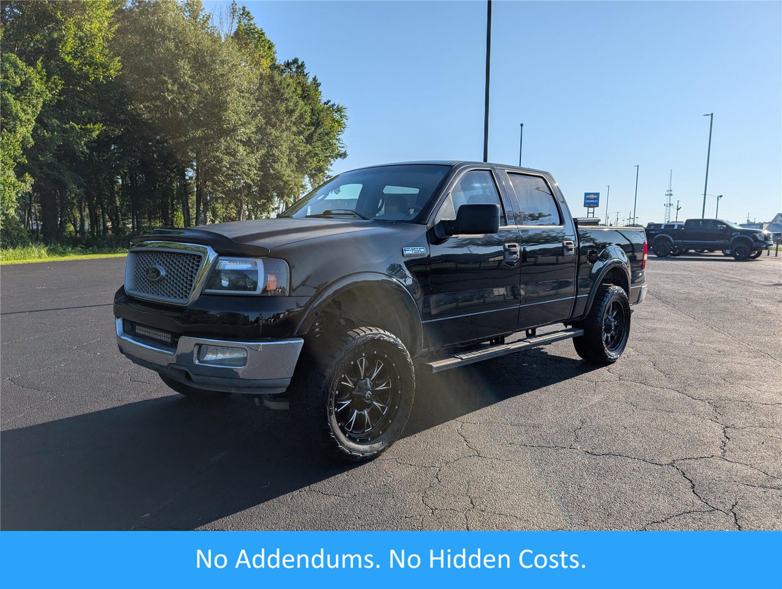Black 2004 Ford F-150 Pickup Truck Four-Wheel Drive 