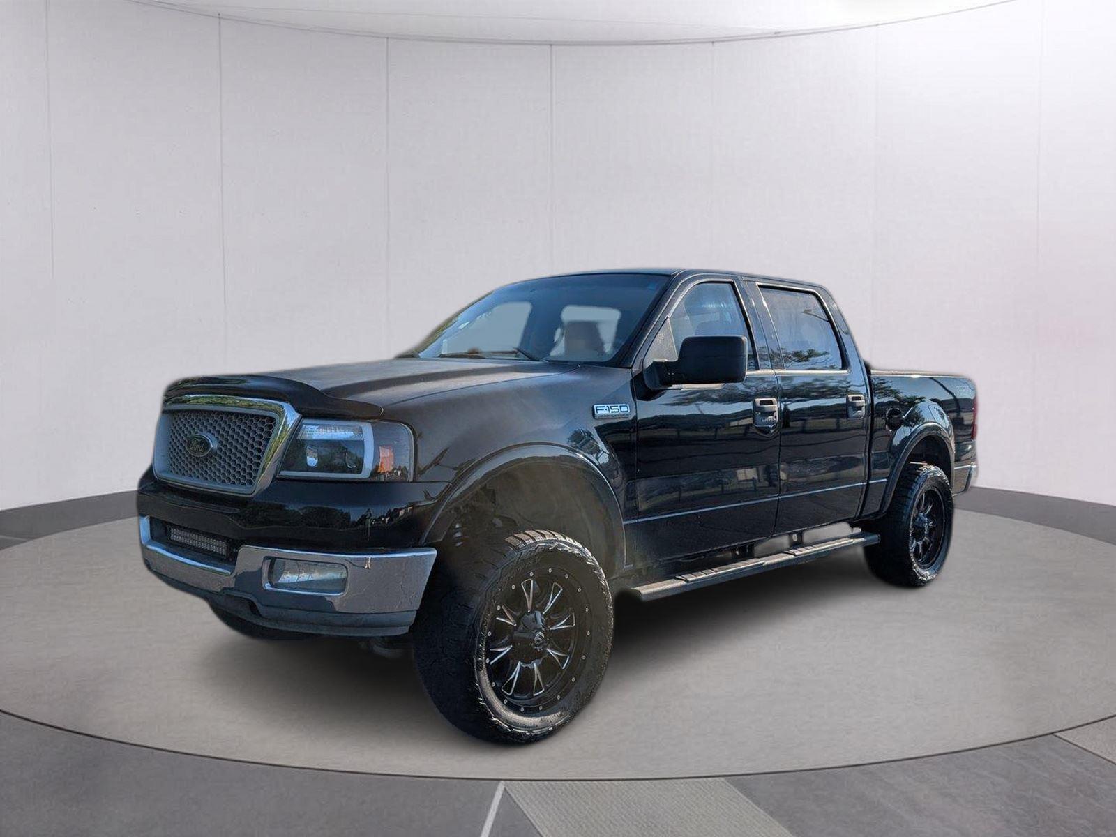 Black 2004 Ford F-150 Pickup Truck Four-Wheel Drive 