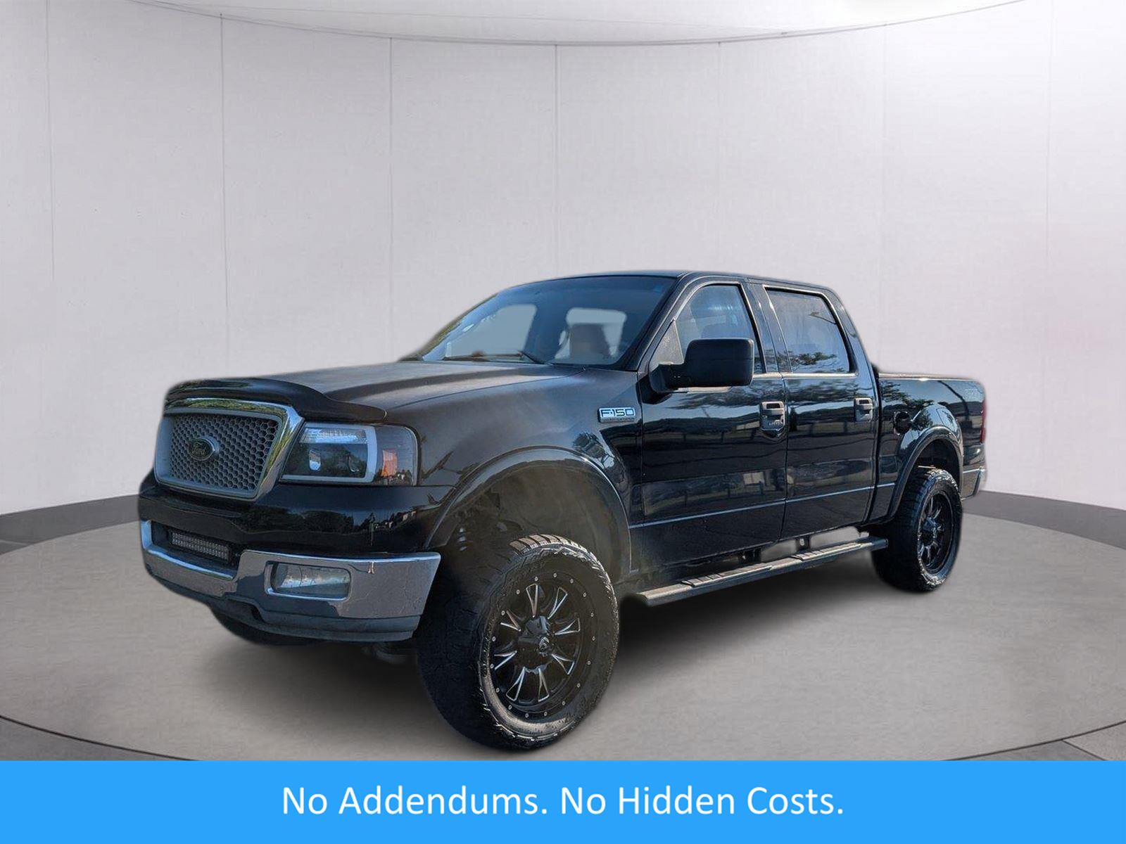 Black 2004 Ford F-150 Pickup Truck Four-Wheel Drive 