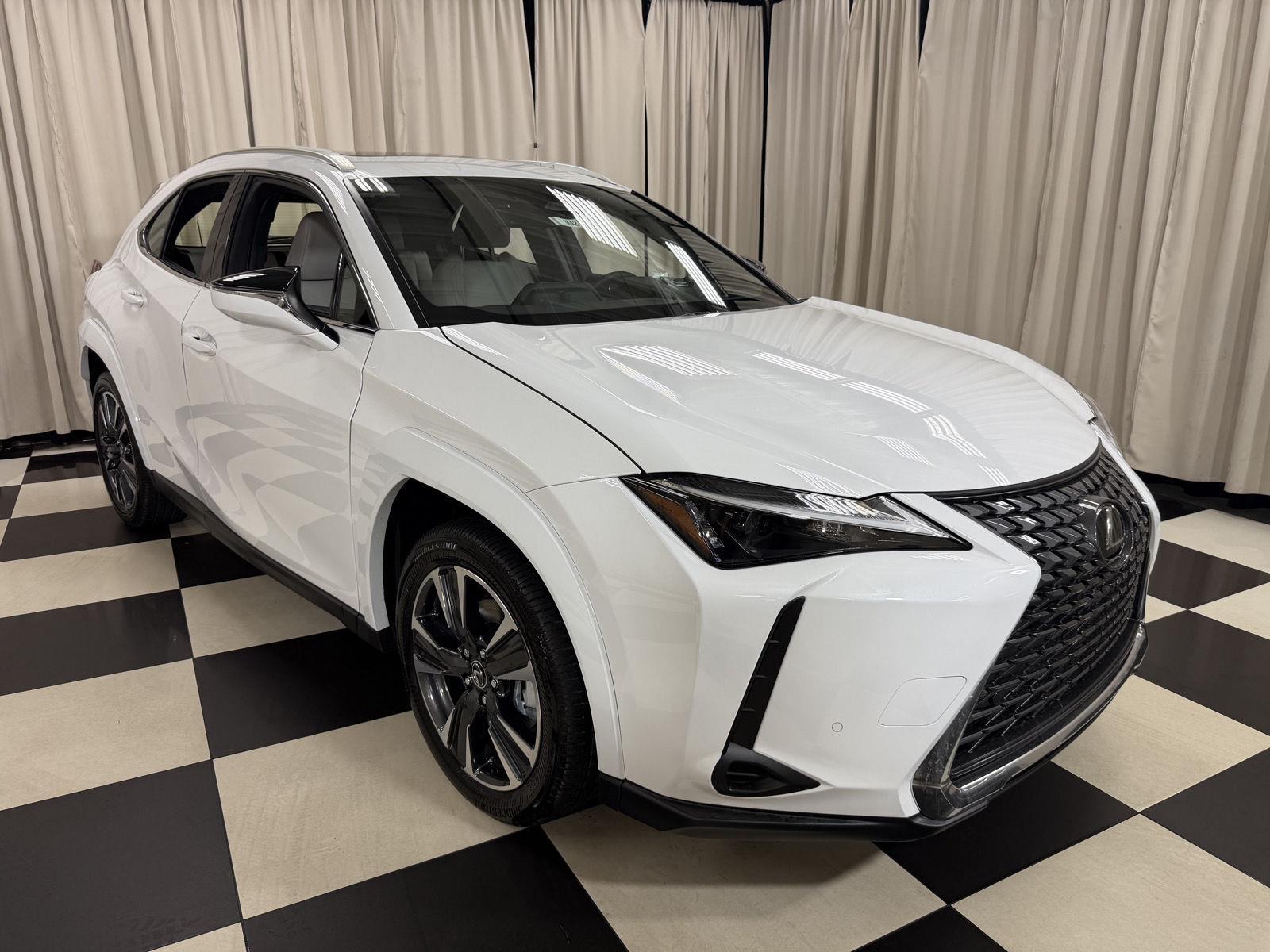 Ultra White 2026 Lexus UX Hybrid SUV / Crossover All-Wheel Drive Continuously Variable Transmission