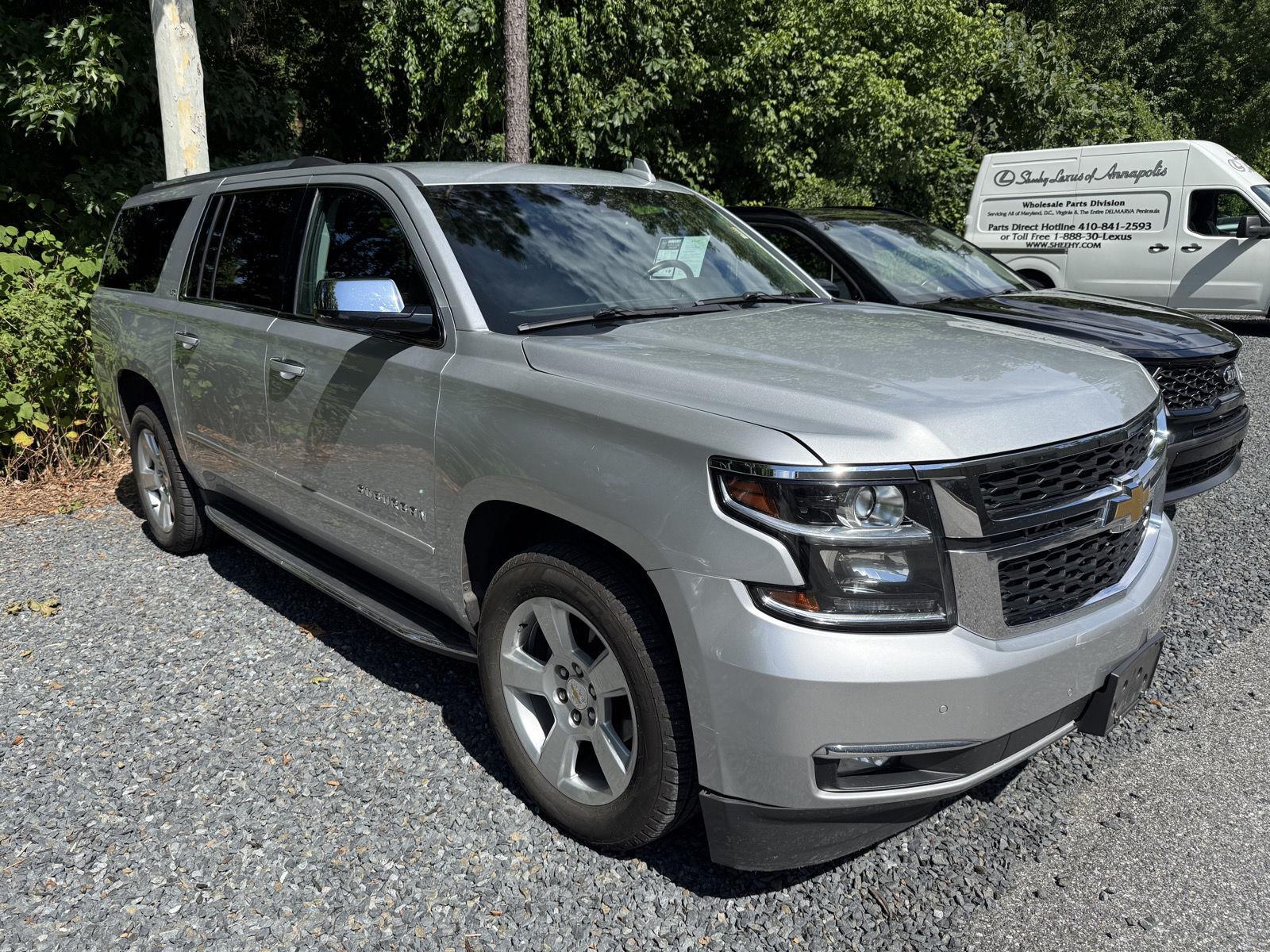 Silver Ice Metallic 2016 Chevrolet Suburban SUV / Crossover Four-Wheel Drive 6-Speed Automatic