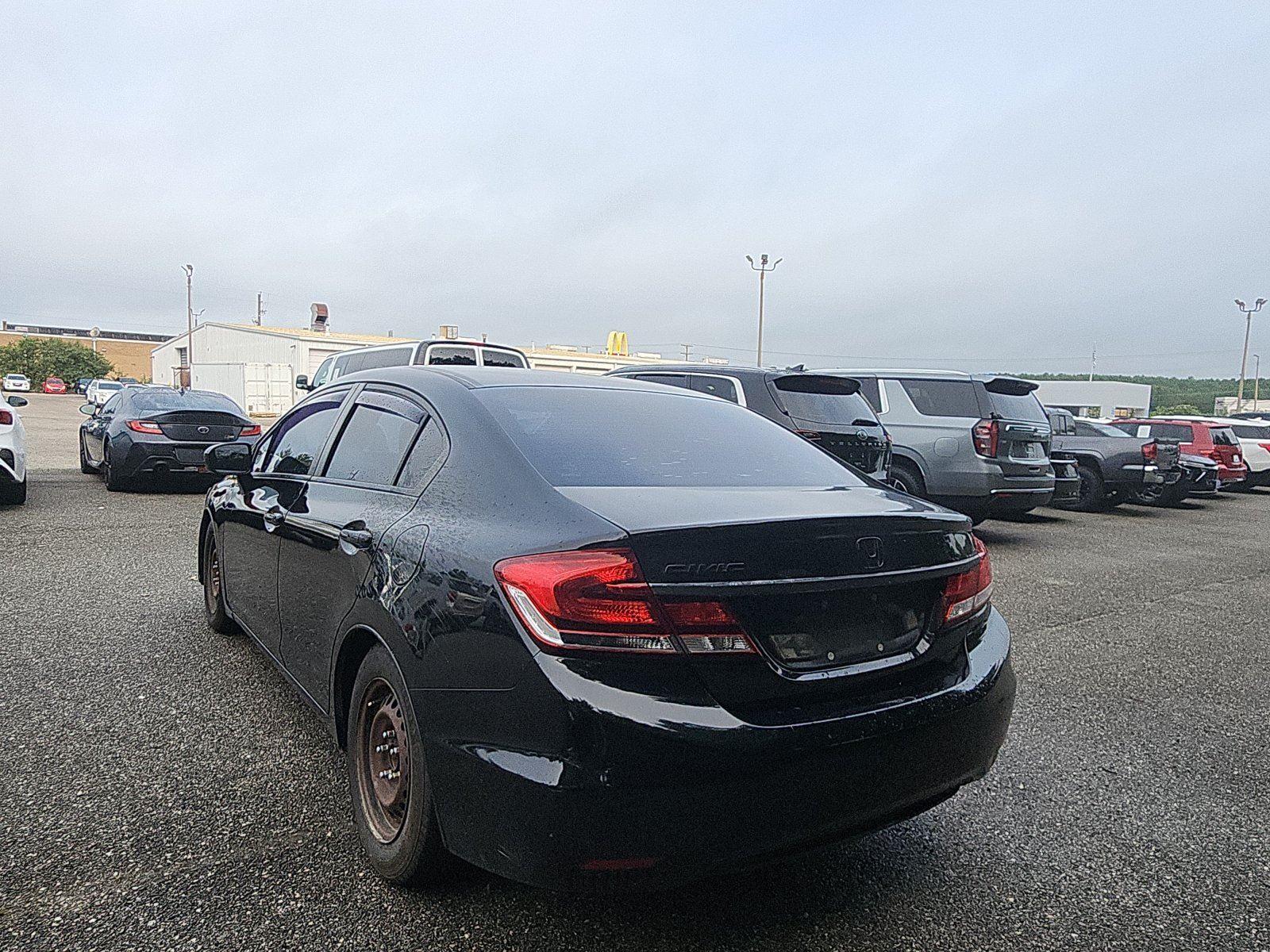 View vehicle photo 3