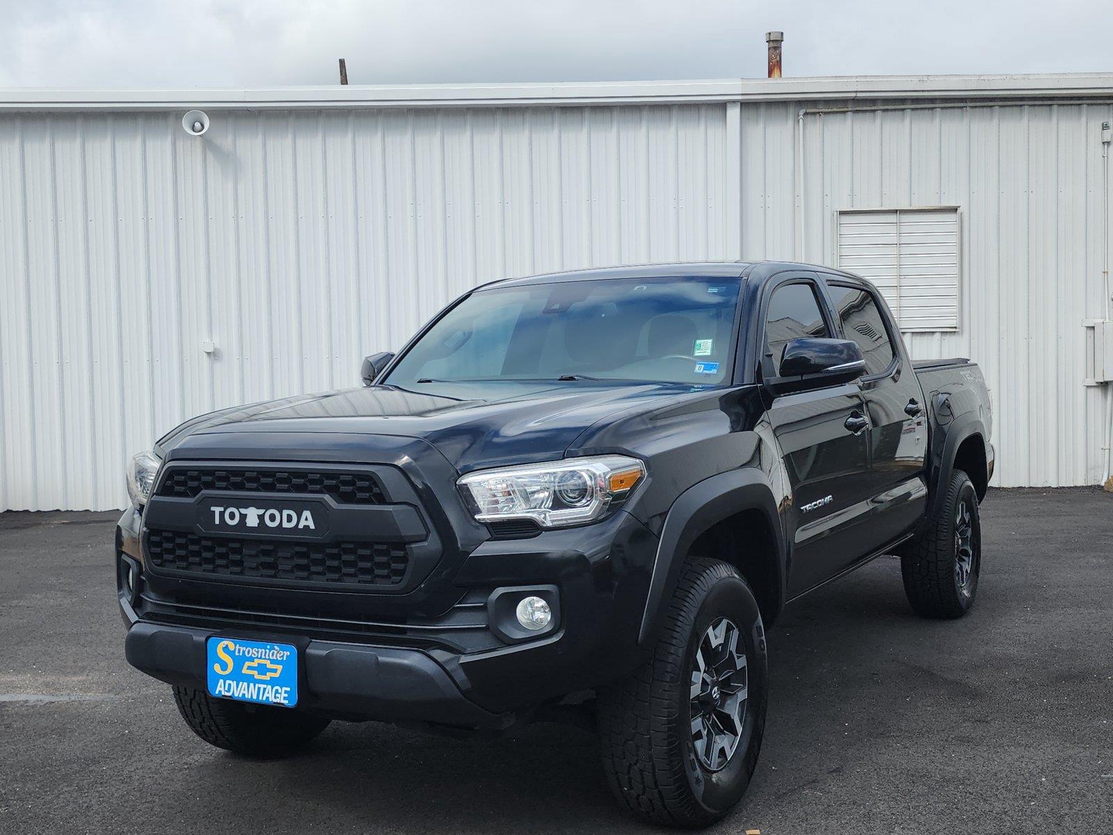 Midnight Black Metallic 2021 Toyota Tacoma Pickup Truck Four-Wheel Drive Manual