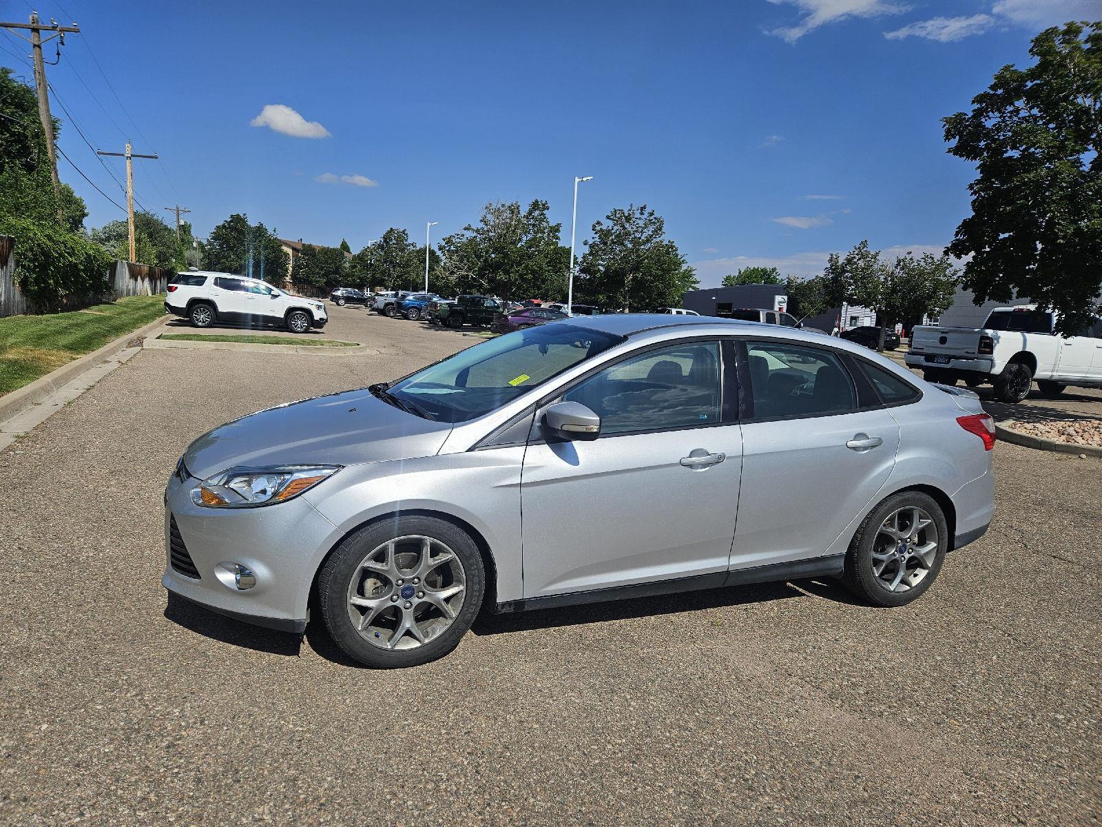 Ingot Silver Metallic 2014 Ford Focus Sedan Front-Wheel Drive 6-Speed Automatic