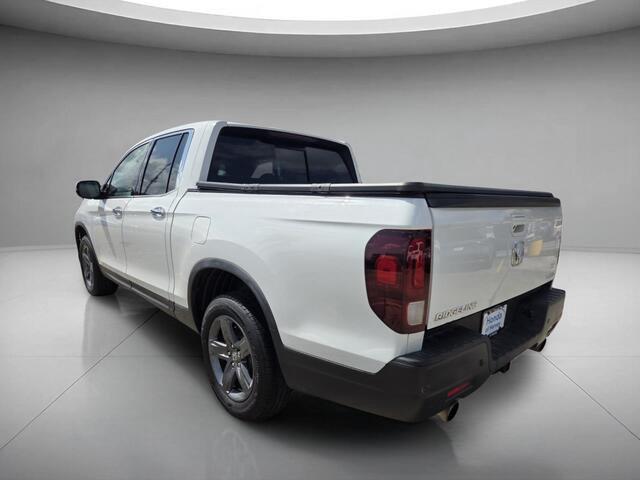 View vehicle photo 3