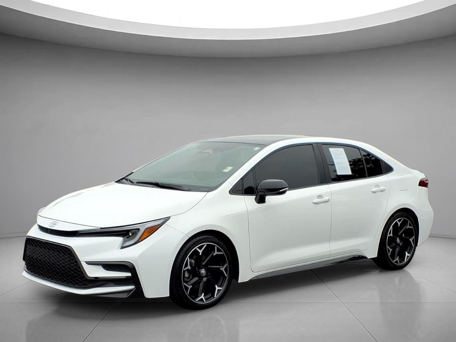 Ice Cap/Midnight Black Metallic 2025 Toyota Corolla FX FWD Sedan Front-Wheel Drive Continuously Variable Transmission