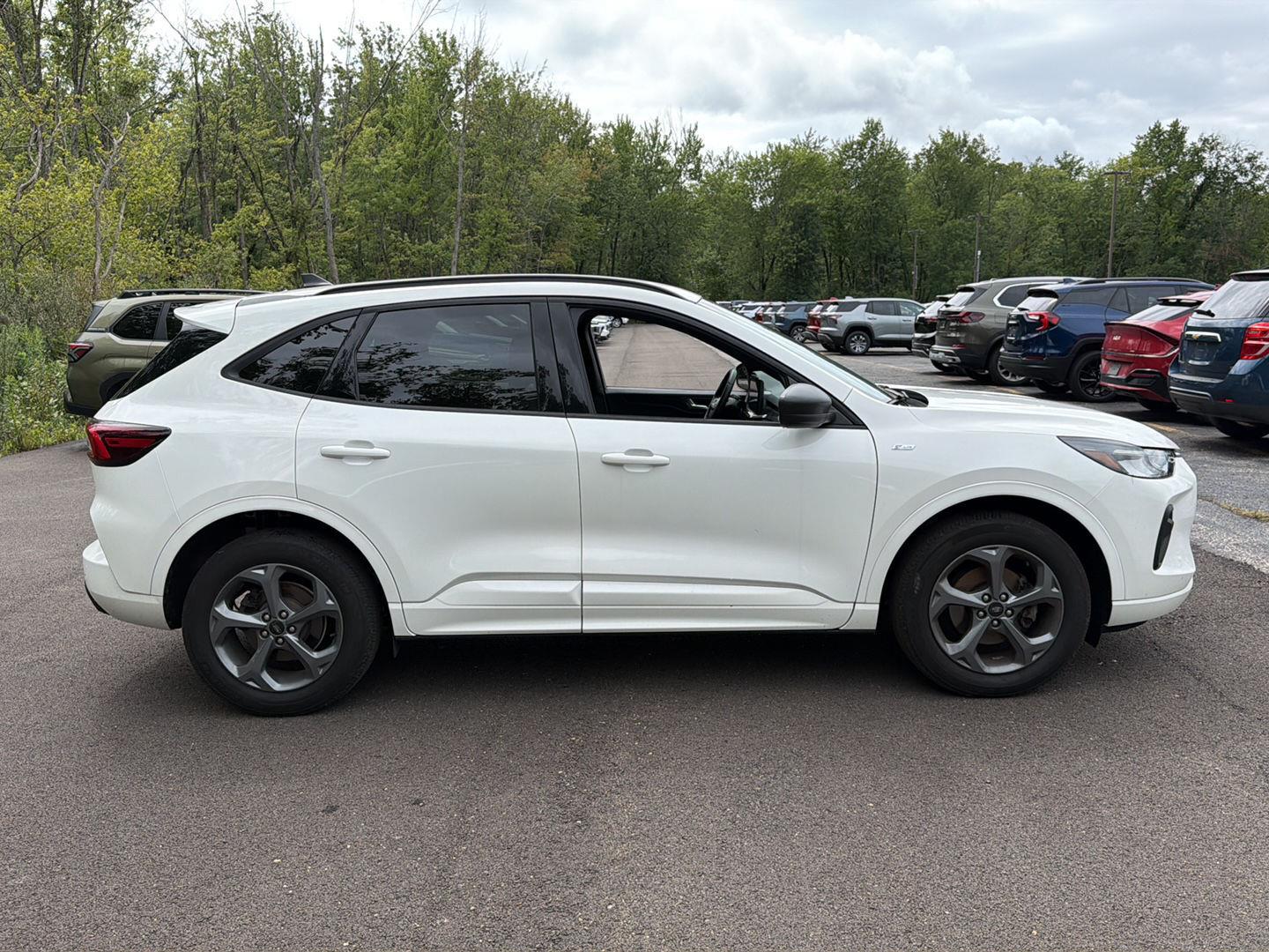Used 2024 Star White Metallic Tri-Coat Ford ST-Line image 7