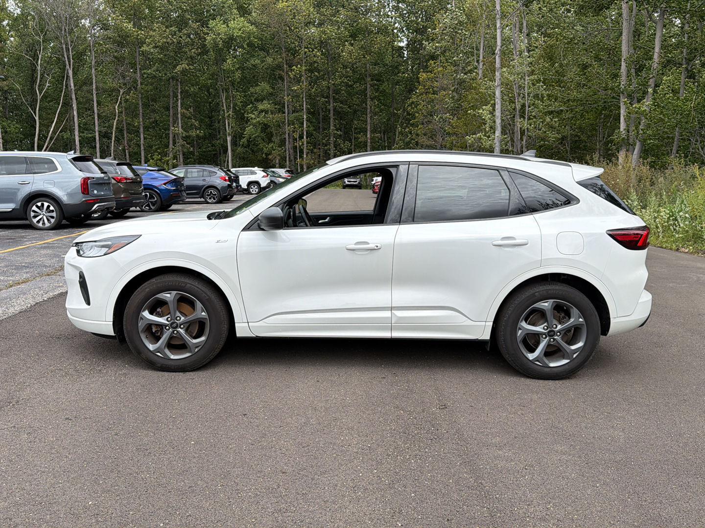 Used 2024 Star White Metallic Tri-Coat Ford ST-Line image 11