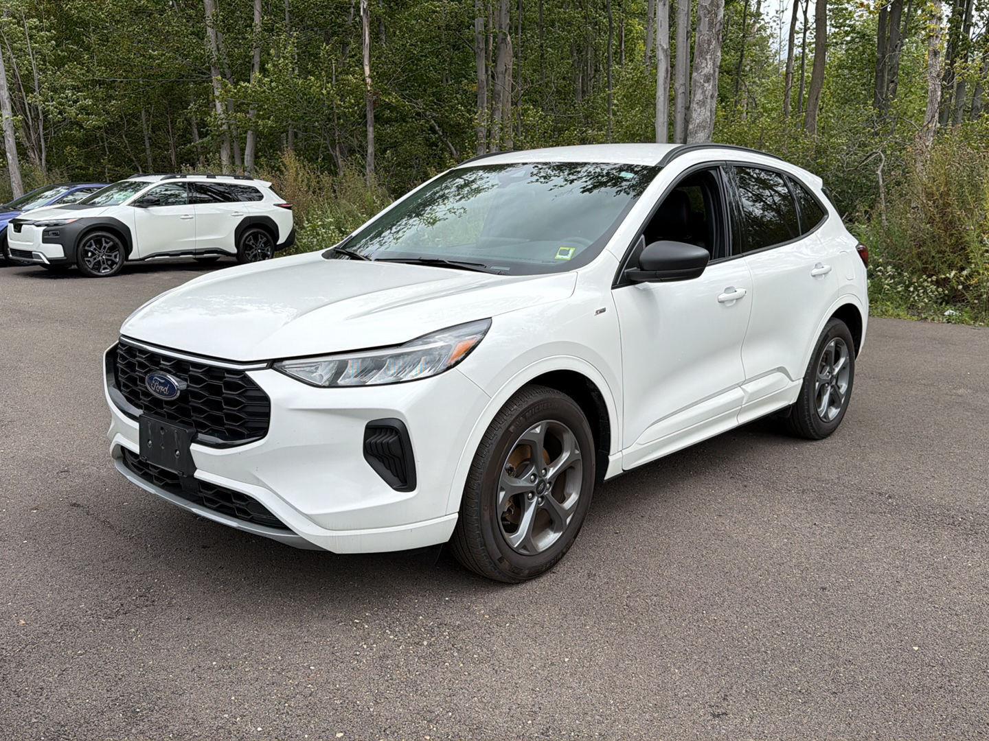 Used 2024 Star White Metallic Tri-Coat Ford ST-Line image 12
