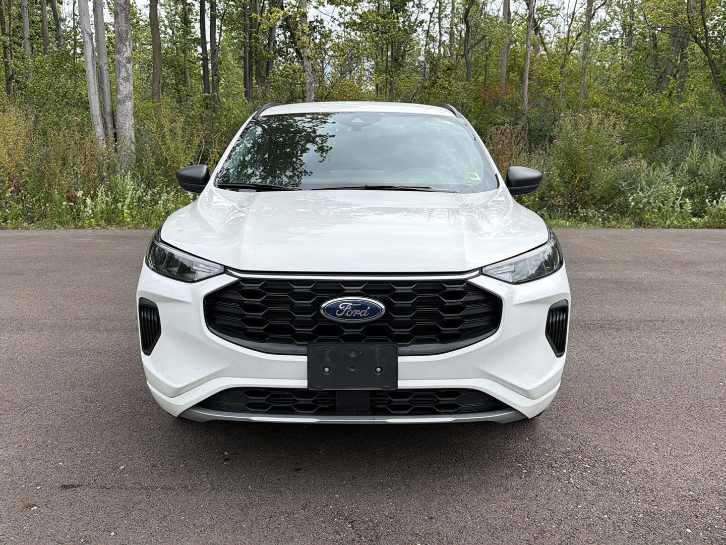 Used 2024 Star White Metallic Tri-Coat Ford ST-Line image 13