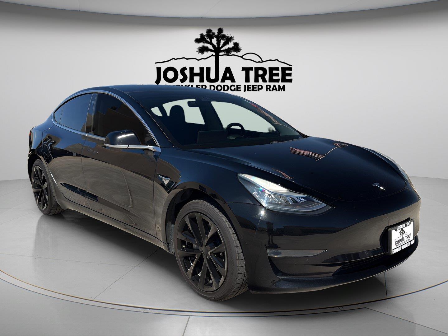 Solid Black 2019 Tesla Model 3 Sedan Rear-Wheel Drive