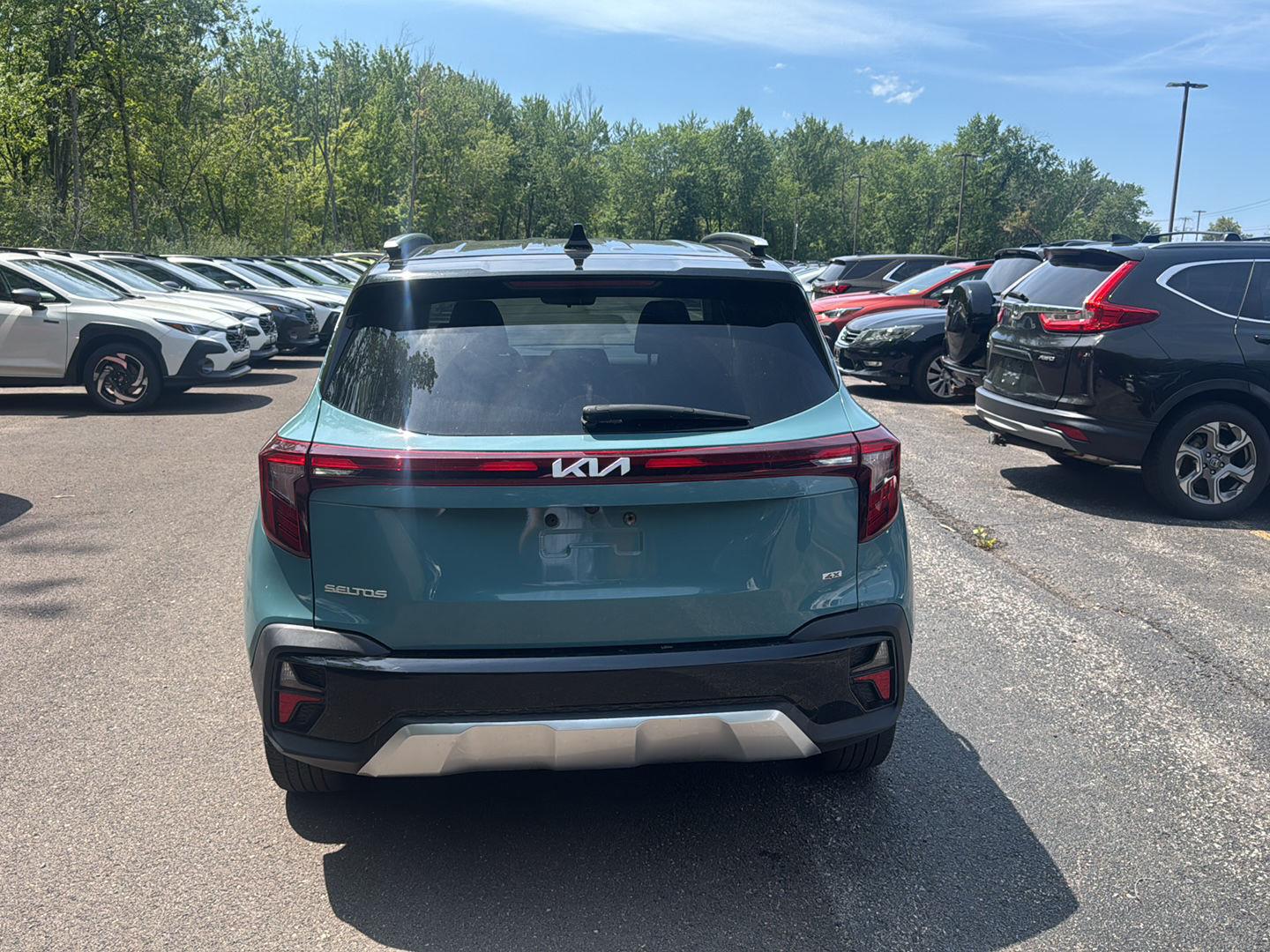 Used 2024 Pluton Blue/Fusion Black Roof Kia S image 6