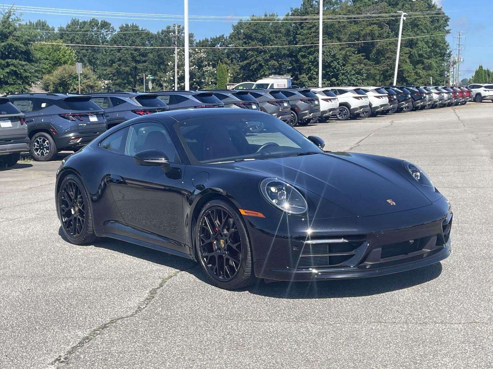 Jet Black Metallic 2024 Porsche 911 Coupe Rear-Wheel Drive 8-Speed Automatic