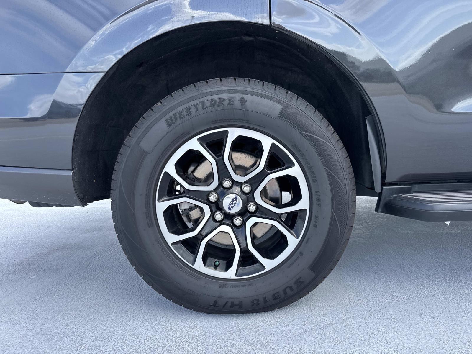 View vehicle photo 7