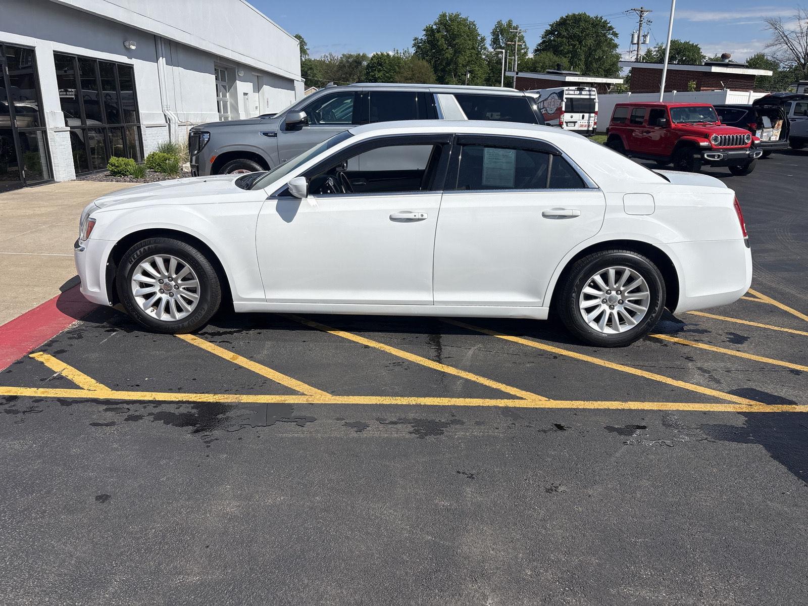 View vehicle photo 3