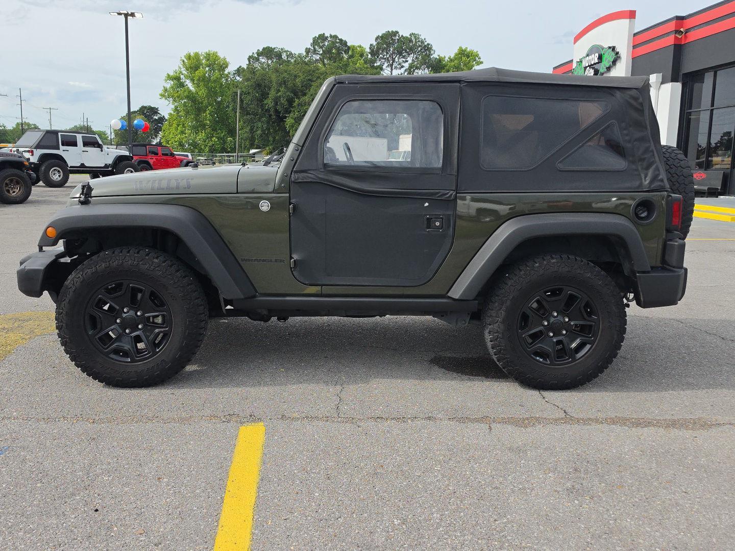 View vehicle photo 3