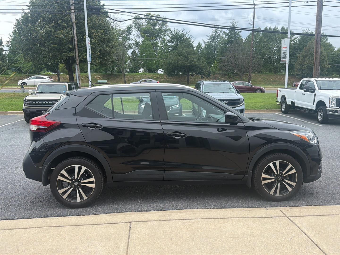 Used 2018 Super Black Nissan SV image 2