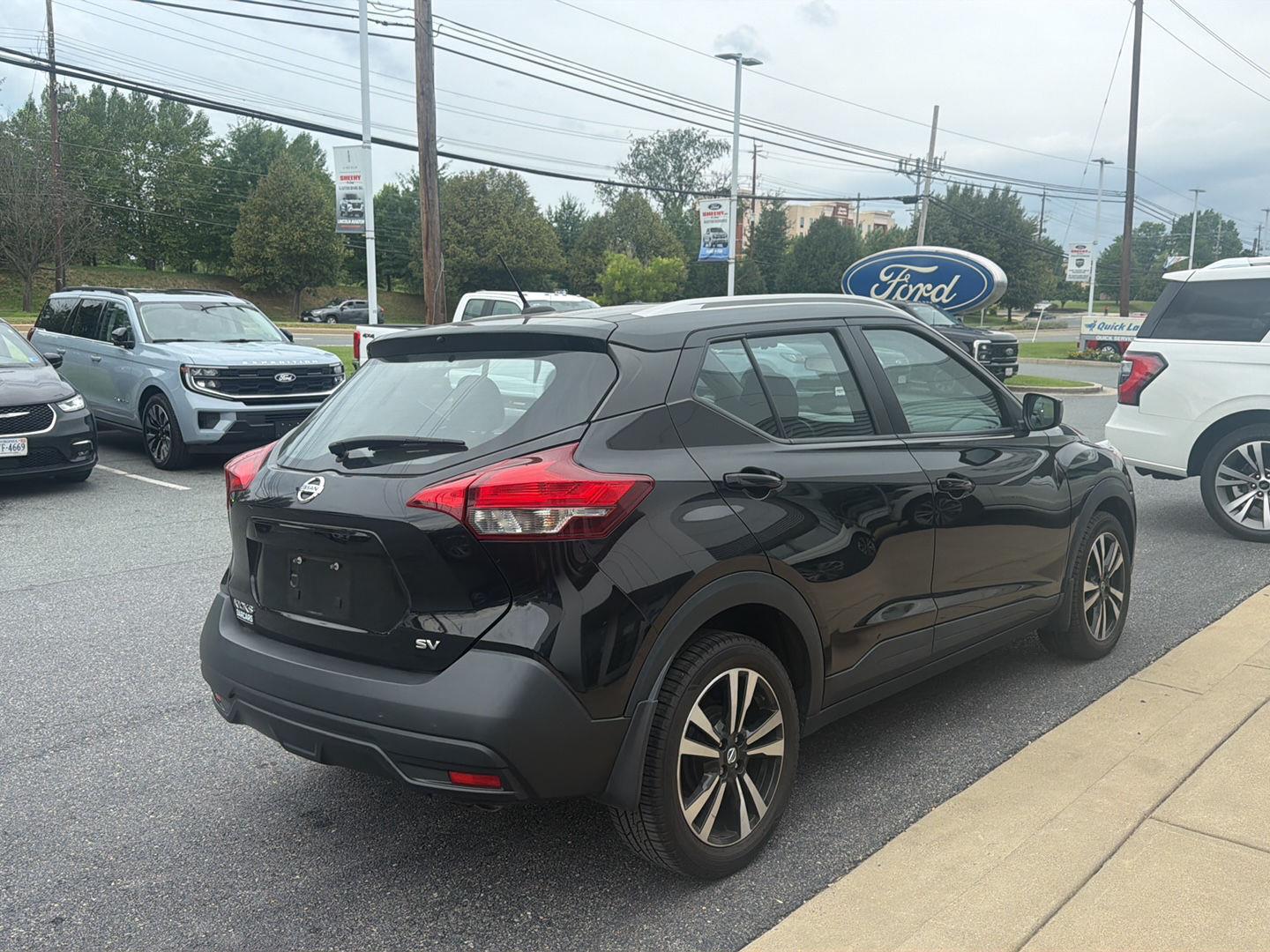 Used 2018 Super Black Nissan SV image 3