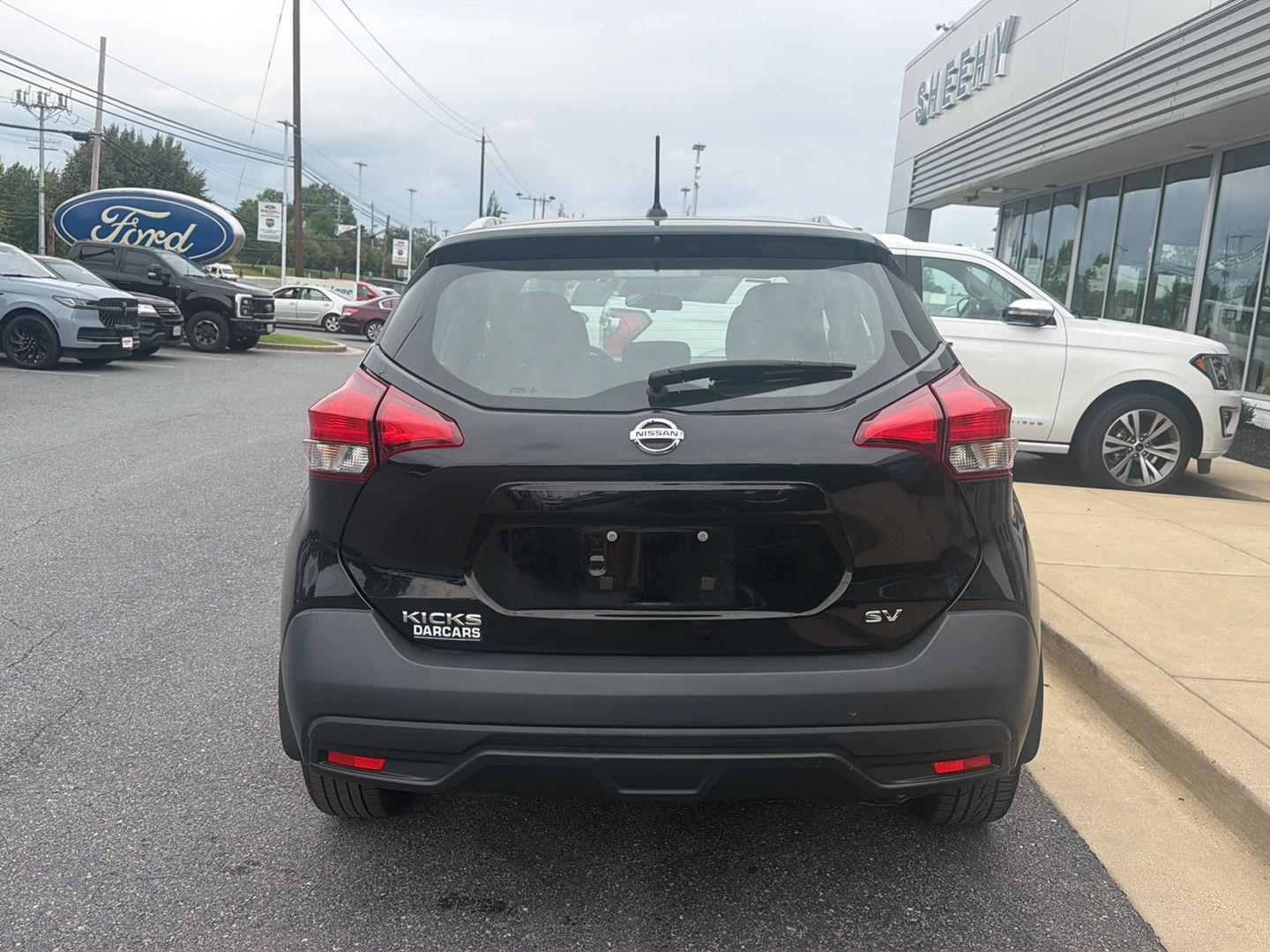 Used 2018 Super Black Nissan SV image 4