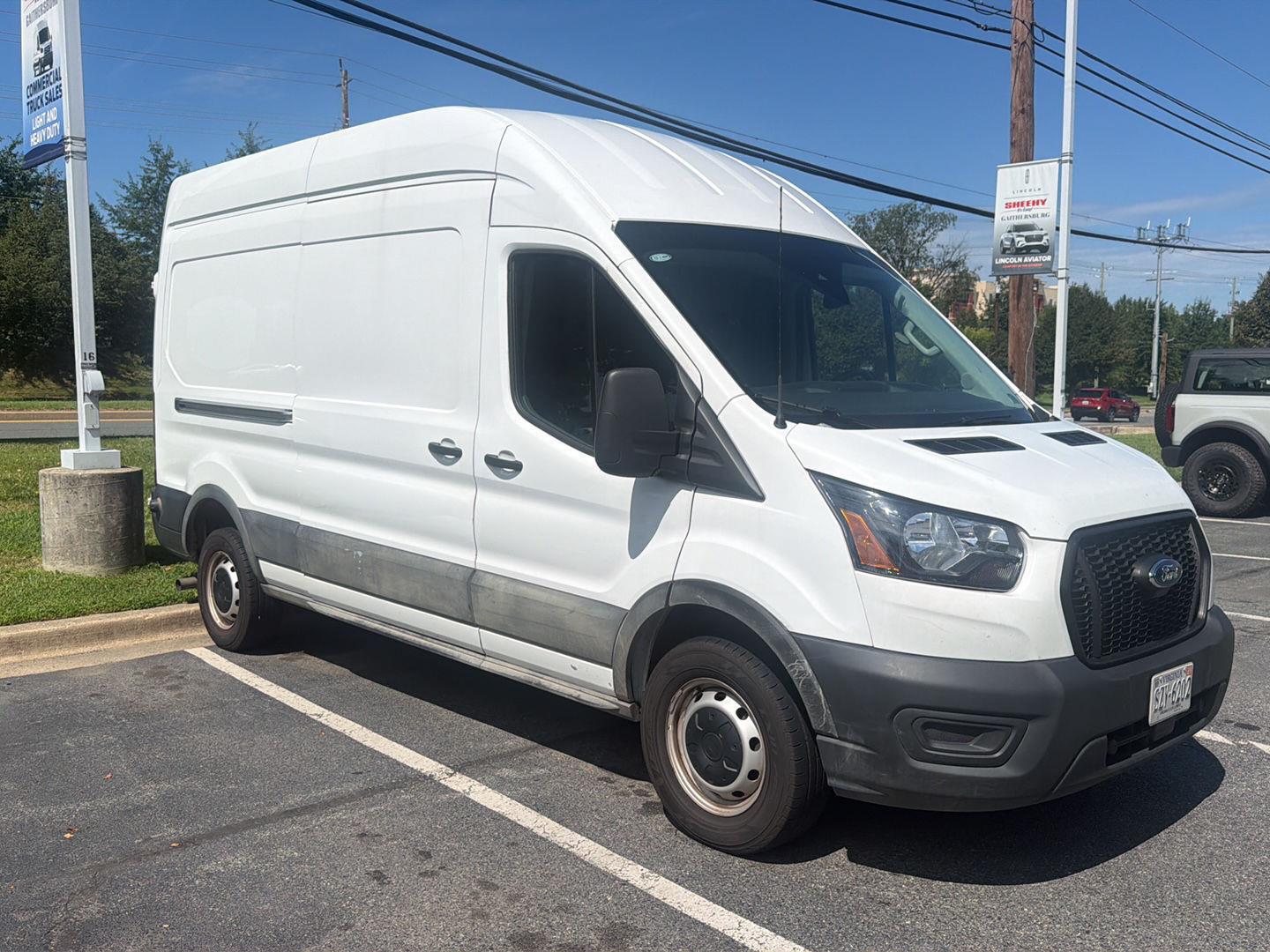 Oxford White 2025 Ford Transit Cargo Van Rear-Wheel Drive 