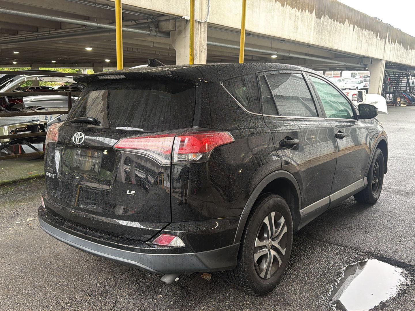 Used 2018 Black TOYOTA TRUCK LE FWD image 2