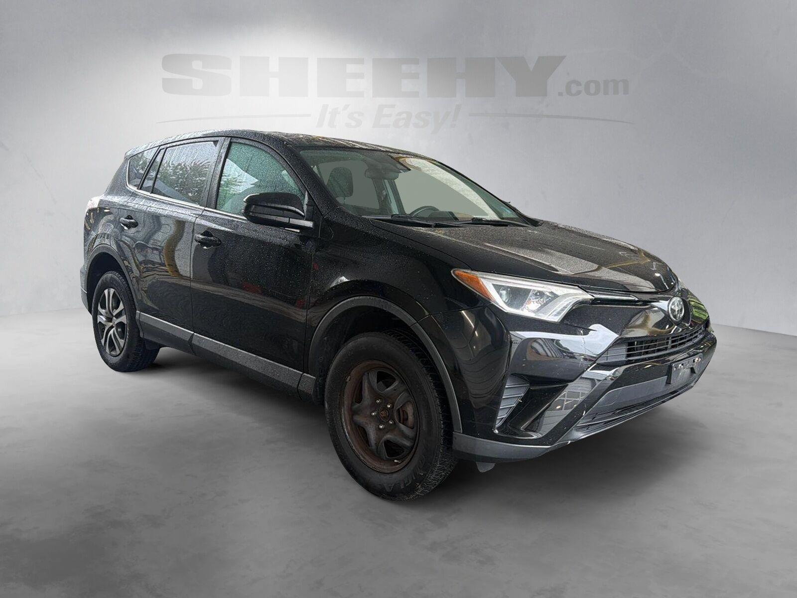 Used 2018 Black TOYOTA TRUCK LE FWD image 2