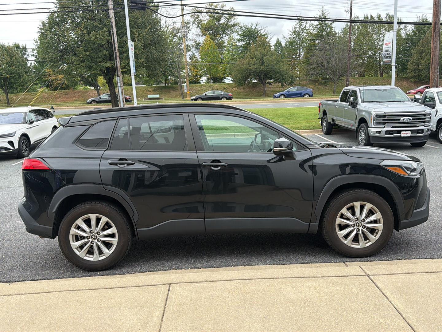 Used 2022 Jet Black Toyota LE image 2