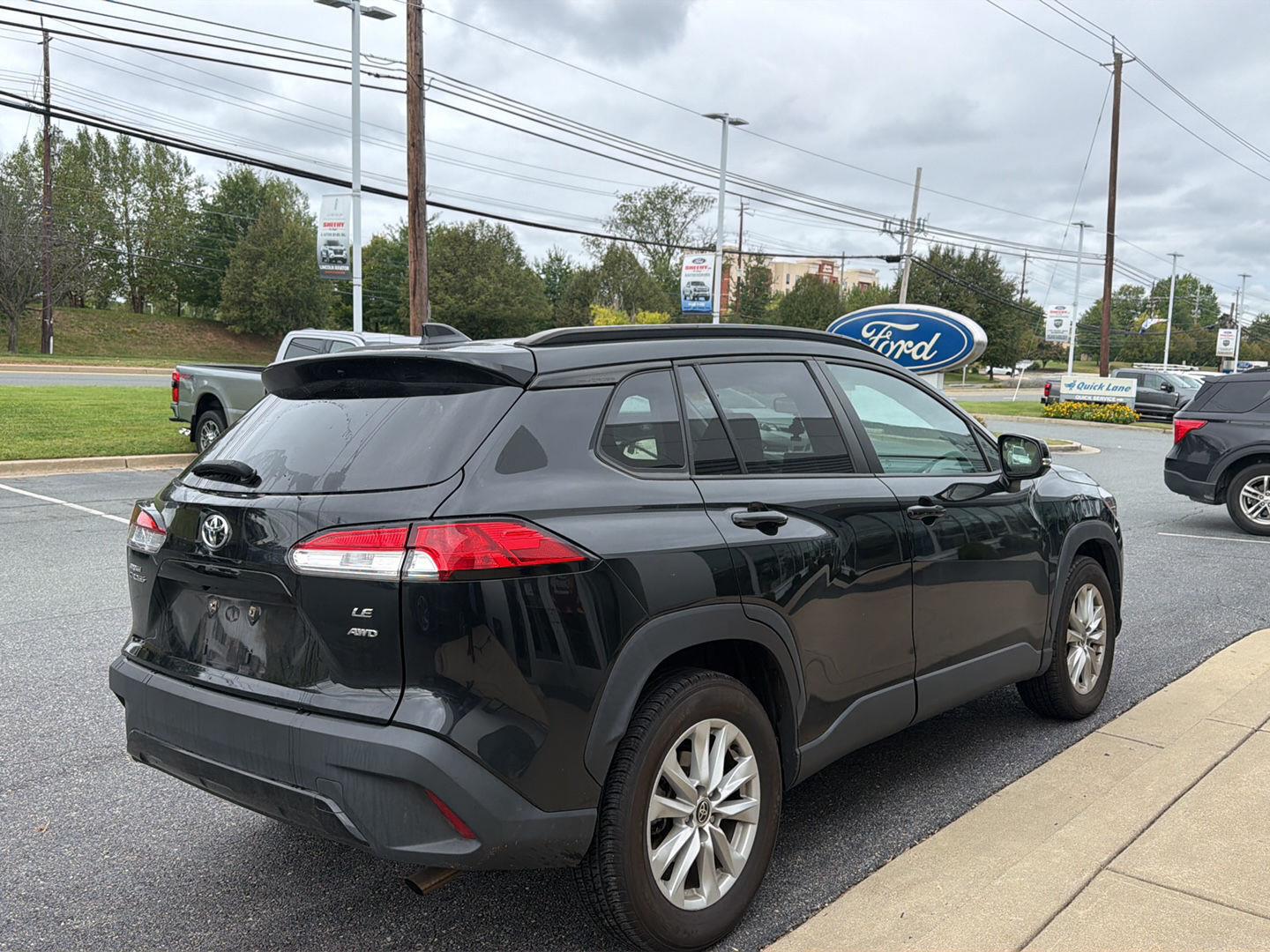Used 2022 Jet Black Toyota LE image 3