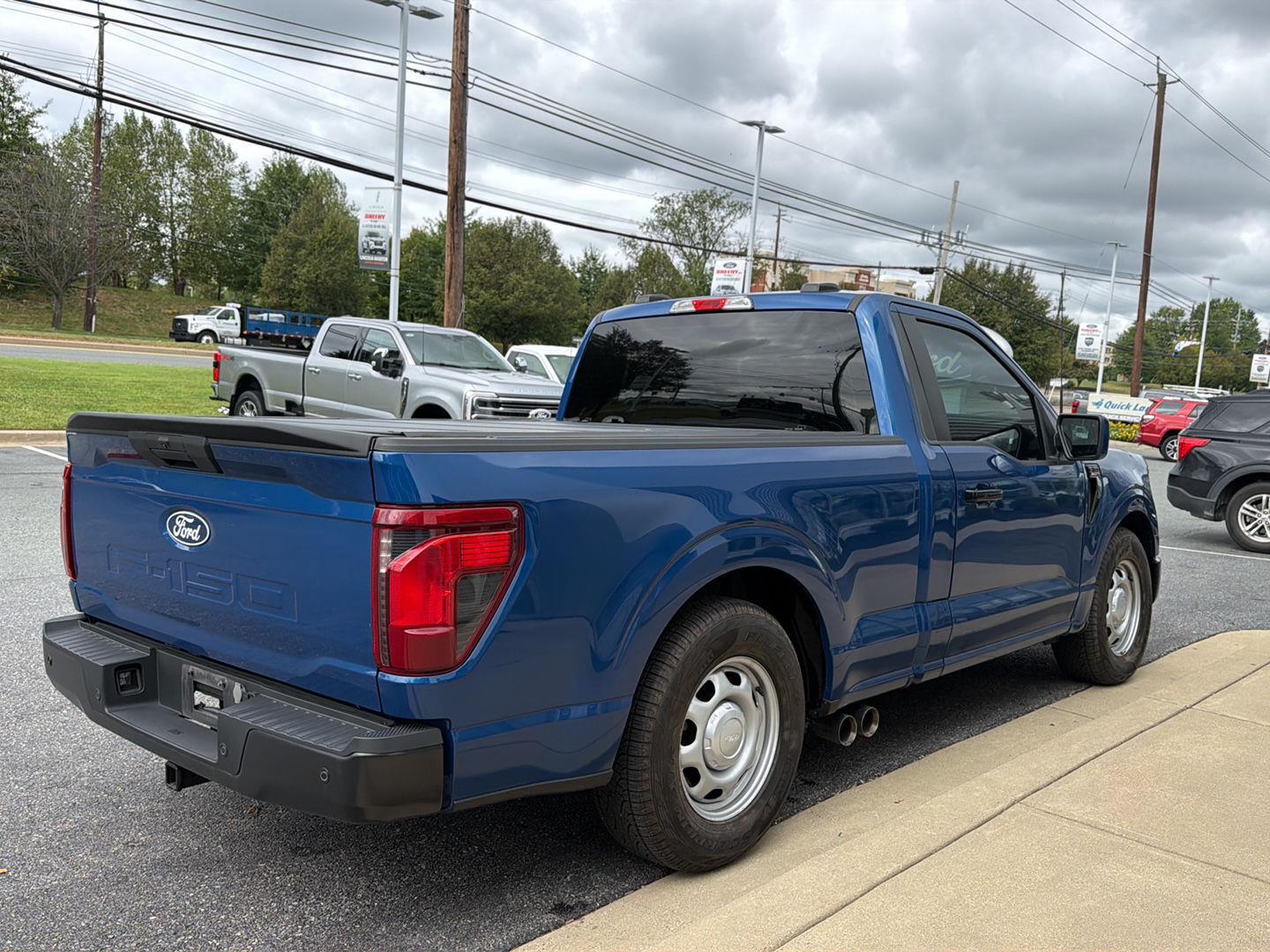 Used 2024 Atlas Blue Metallic Ford XL image 2