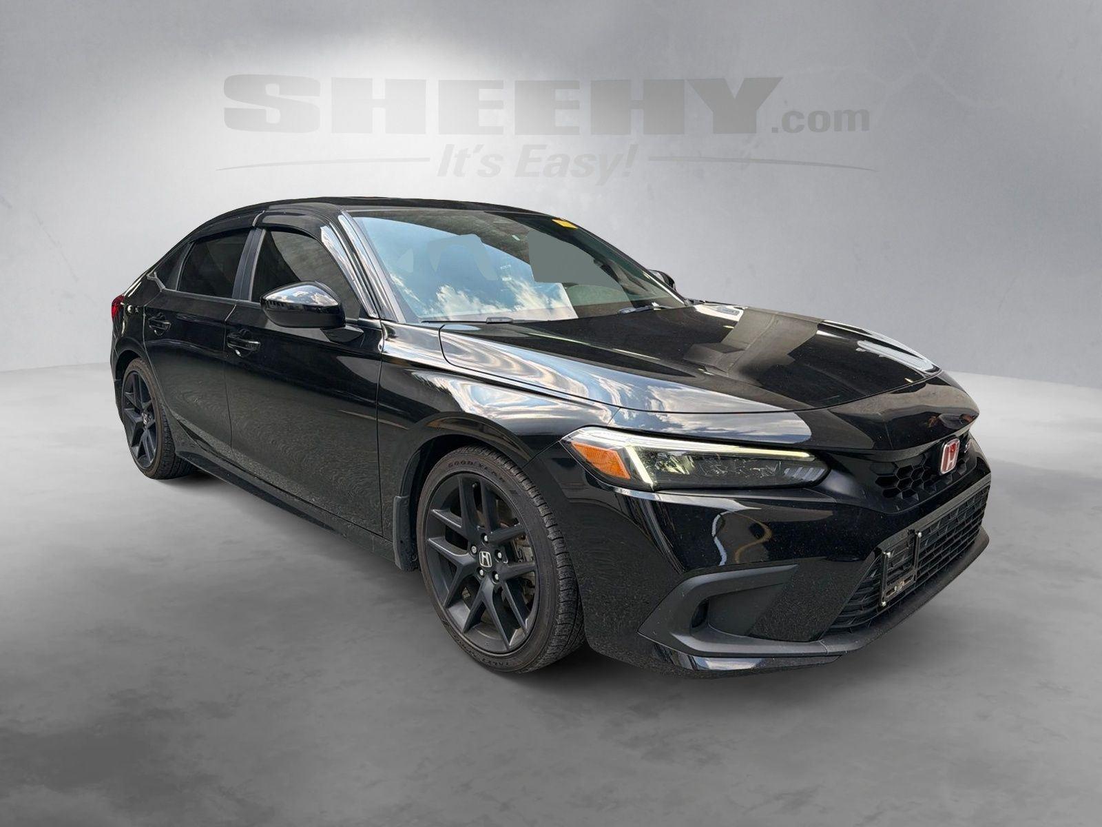 Used 2024 Crystal Black Pearl Honda 4DR MT image 2