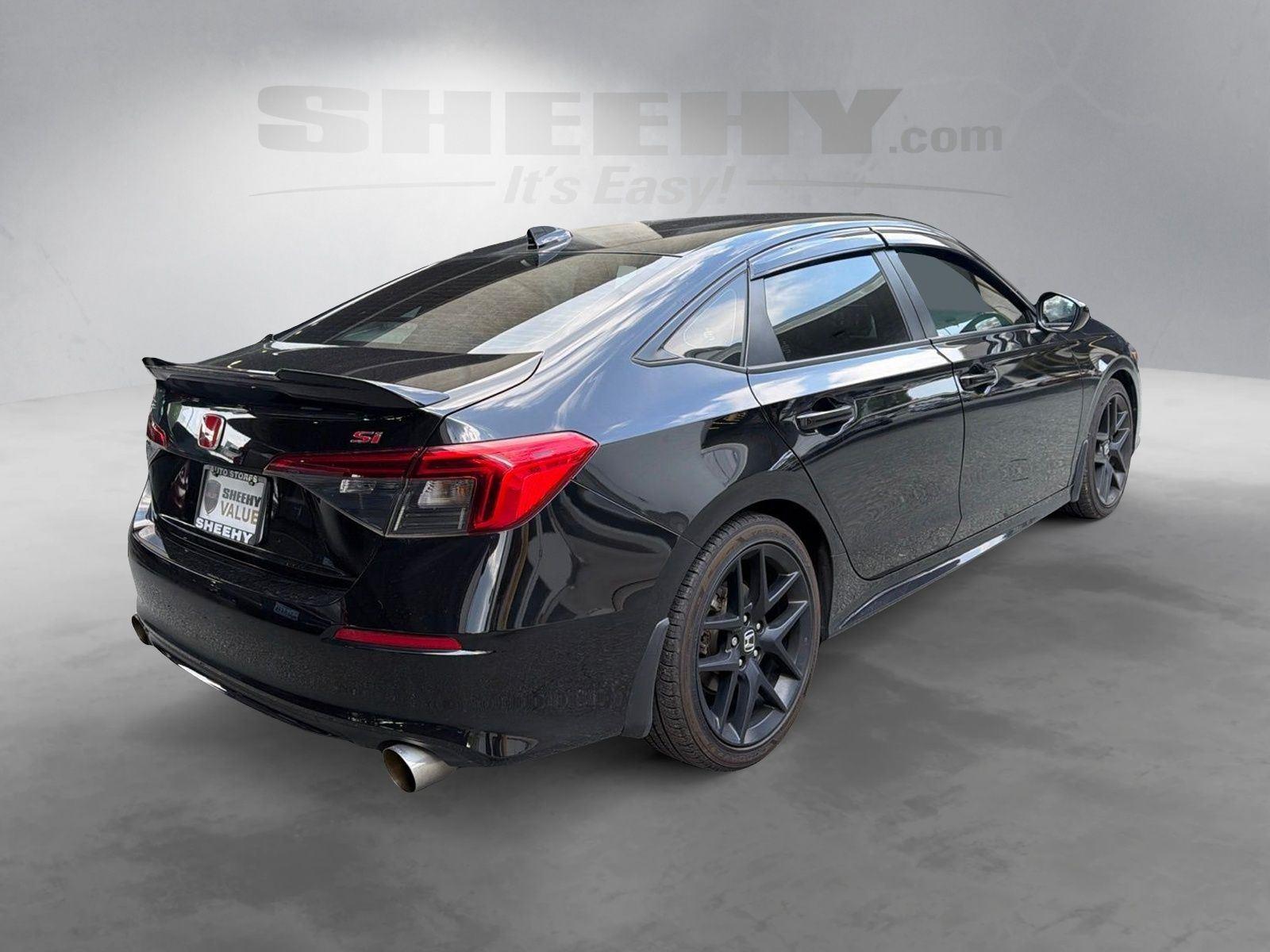 Used 2024 Crystal Black Pearl Honda 4DR MT image 12