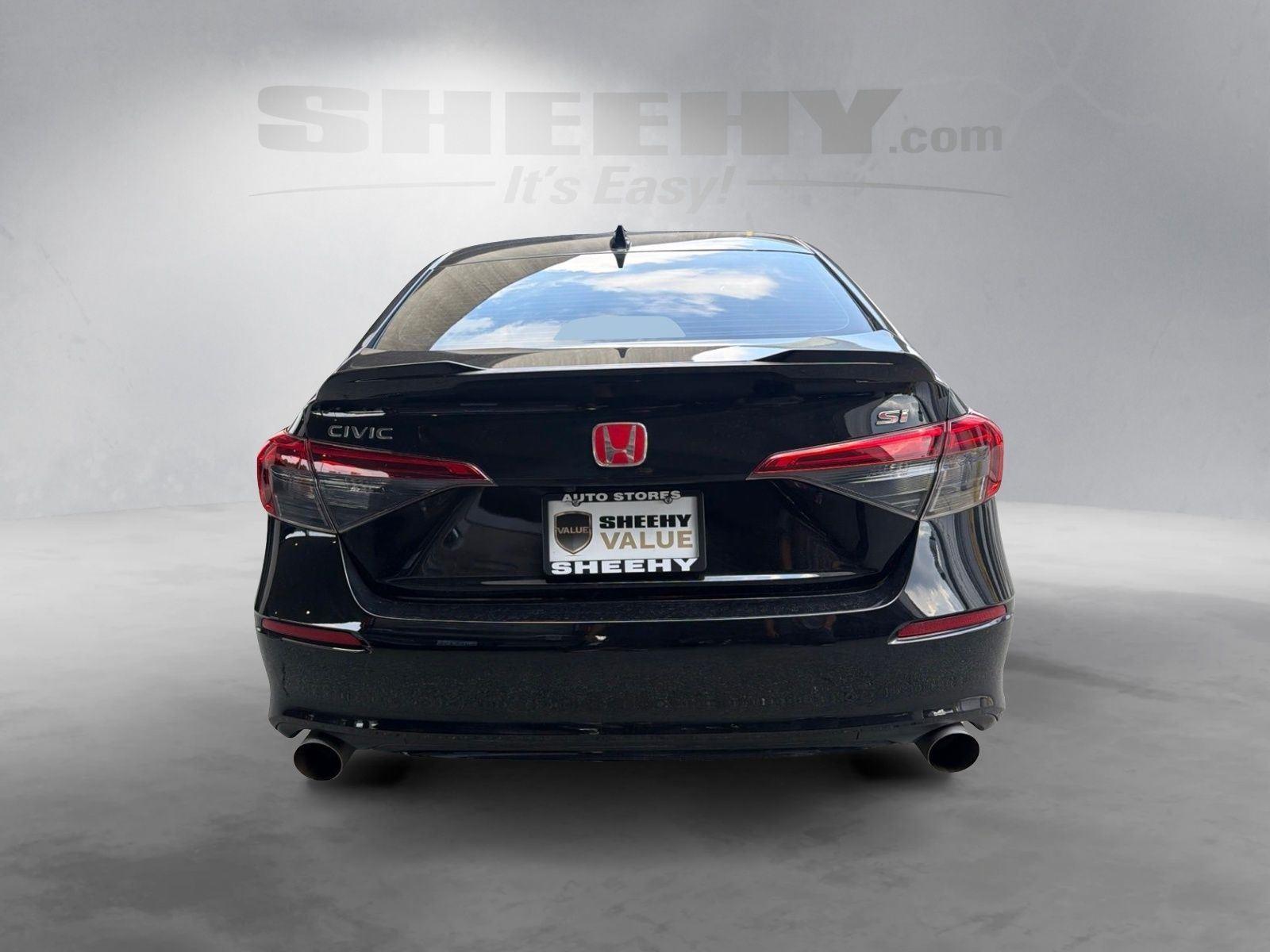 Used 2024 Crystal Black Pearl Honda 4DR MT image 13