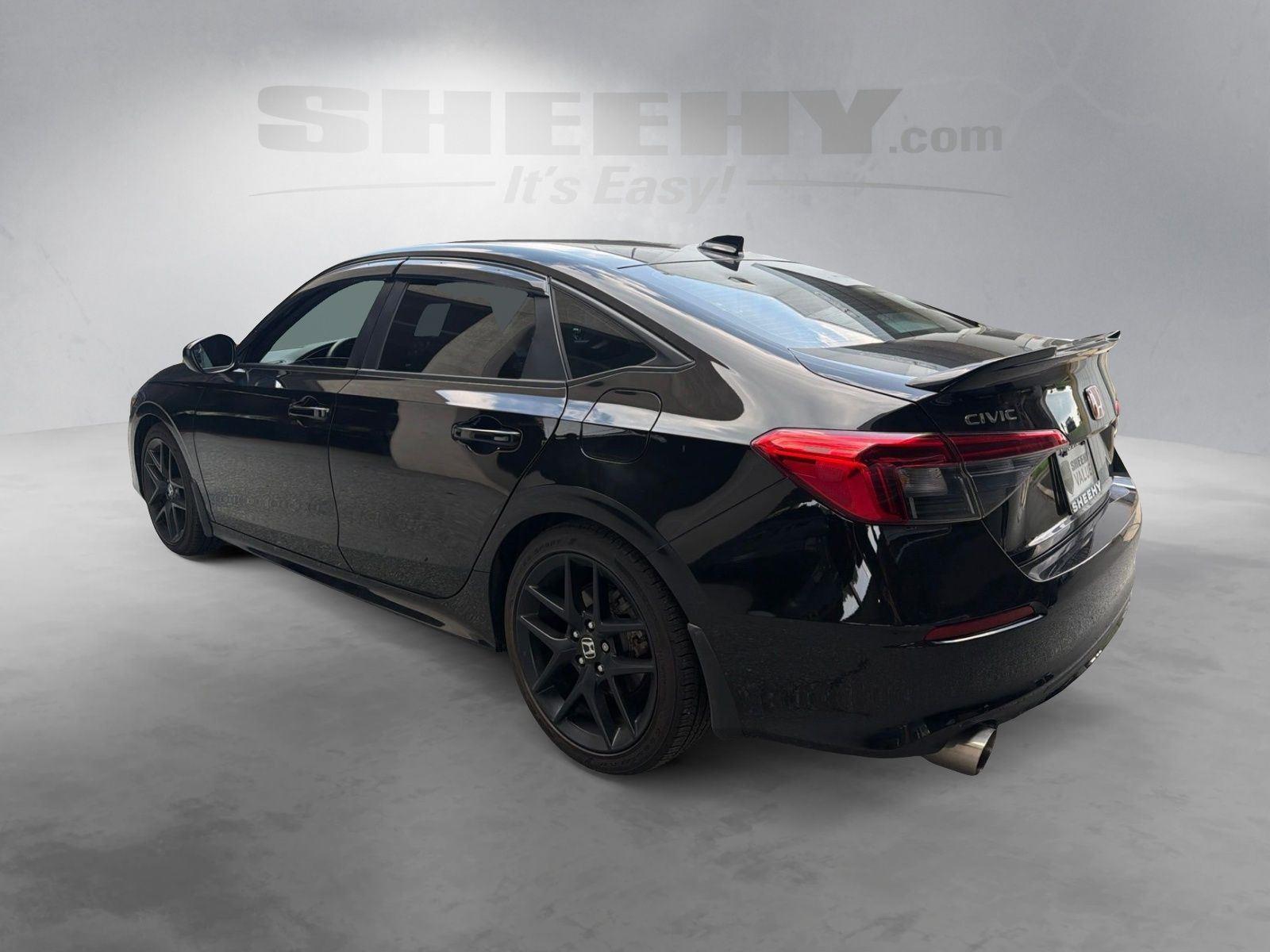 Used 2024 Crystal Black Pearl Honda 4DR MT image 14