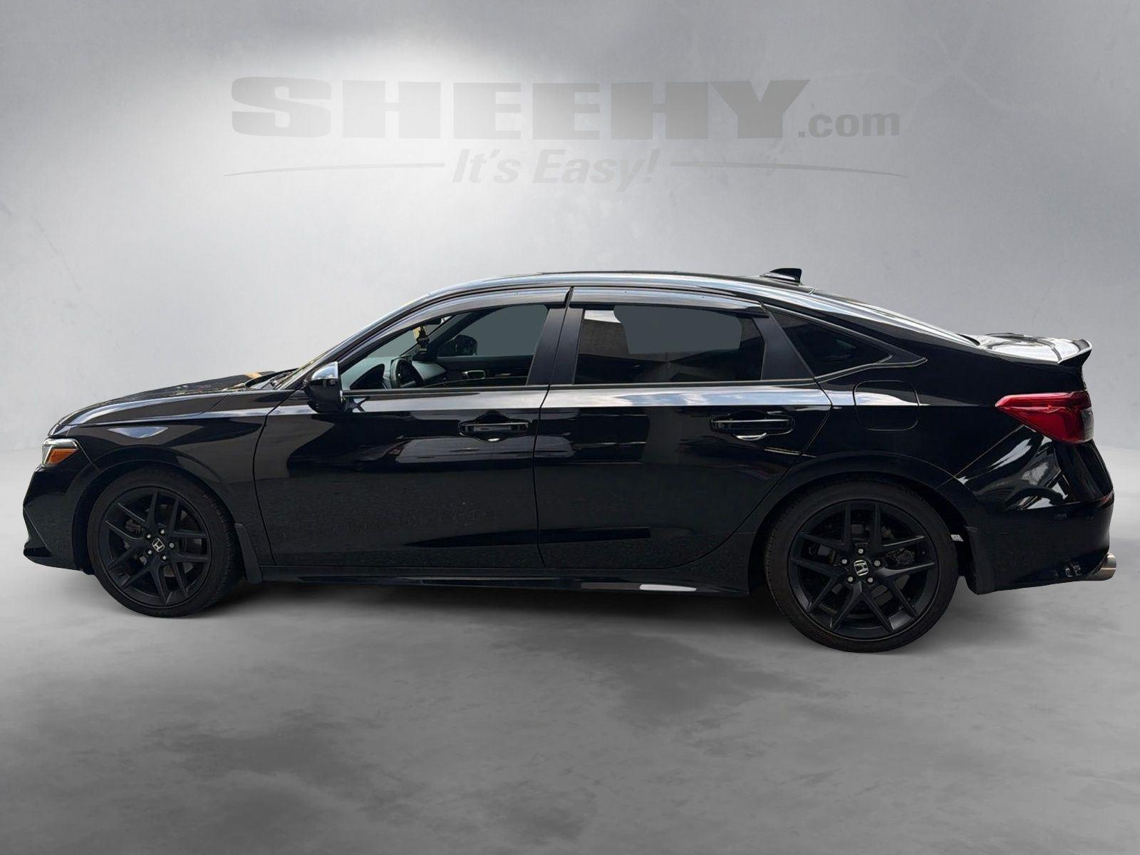 Used 2024 Crystal Black Pearl Honda 4DR MT image 15