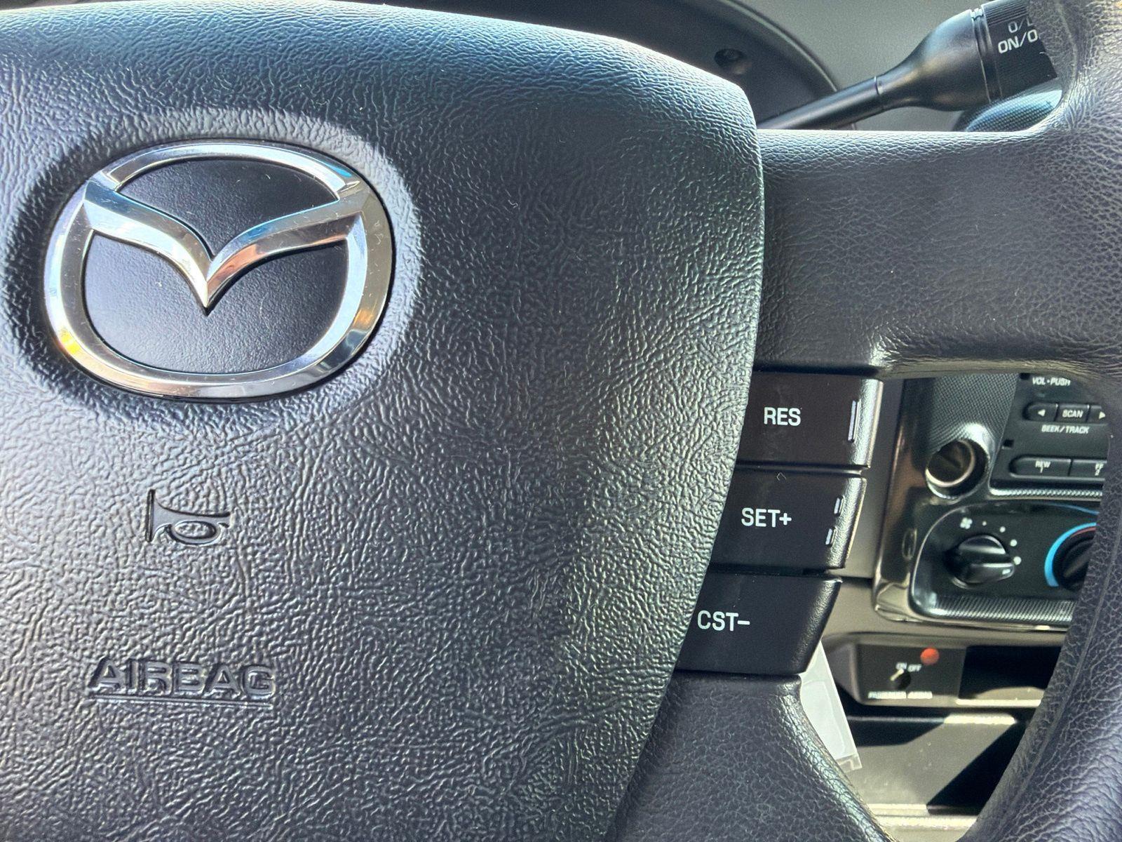 Used 2006 Monochromatic Dark Titanium Mazda DS image 15