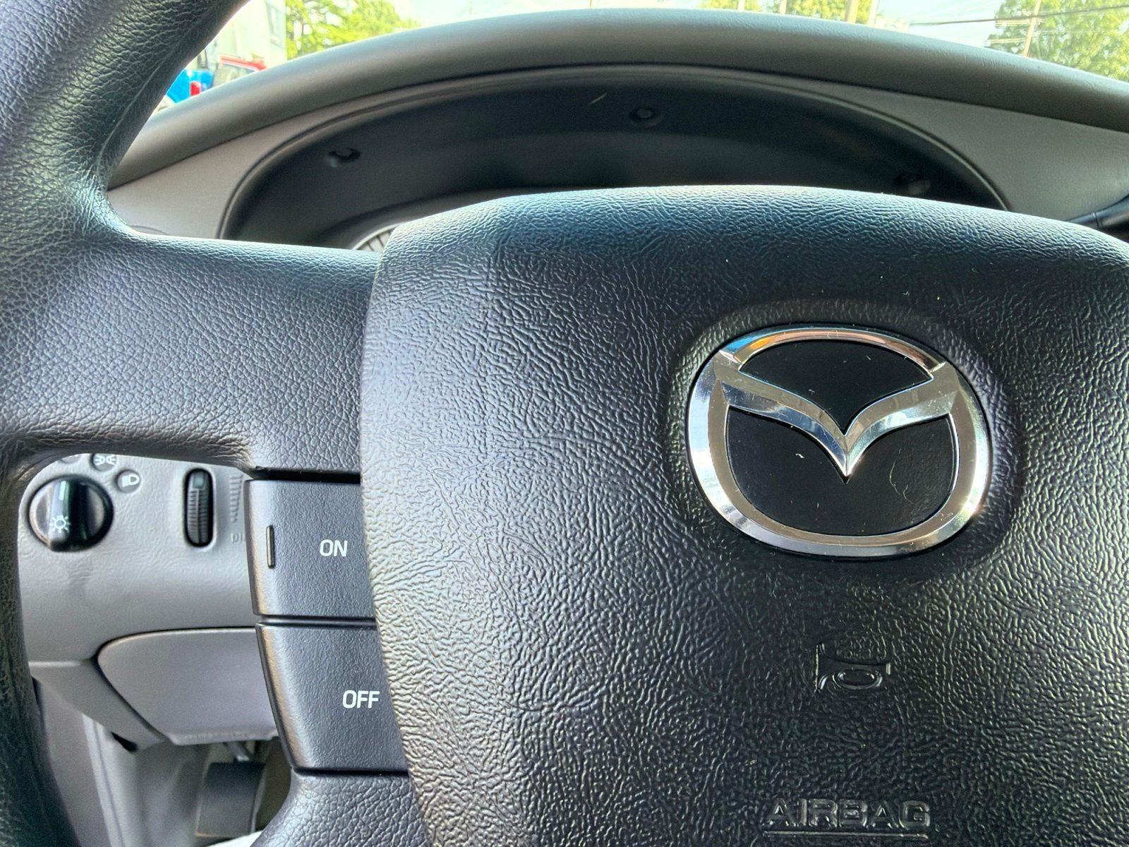 Used 2006 Monochromatic Dark Titanium Mazda DS image 16