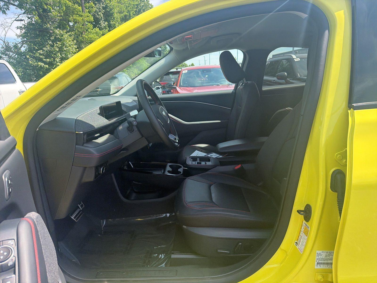 Used 2025 Yellow Ford Premium image 9