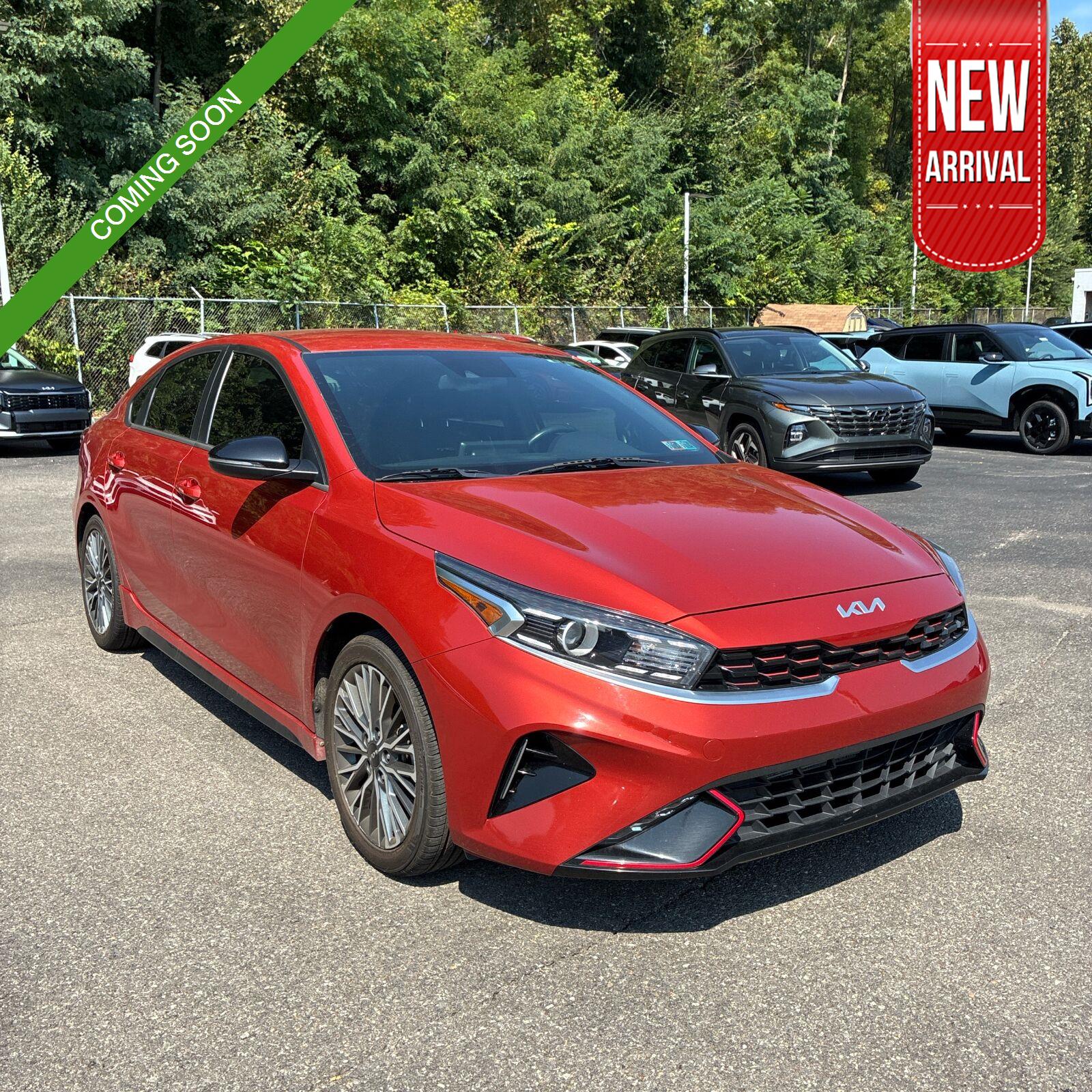 Fire Orange 2023 Kia Forte Sedan Front-Wheel Drive Continuously Variable Transmission