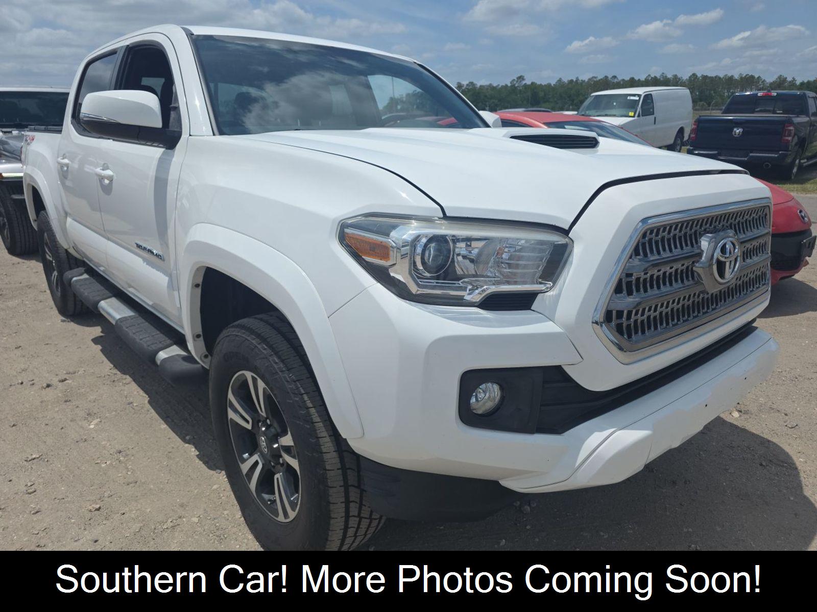 Super White 2016 Toyota Tacoma Double Cab V6 TRD Sport 4WD Pickup Truck Four-Wheel Drive Manual