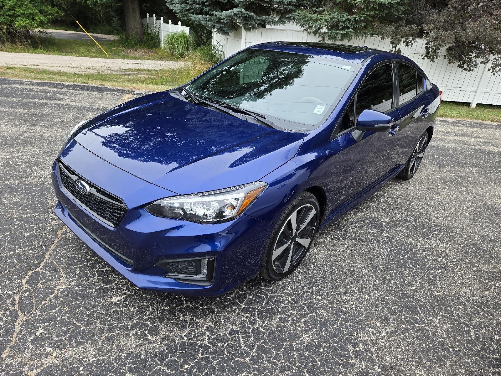 Lapis Blue Pearl 2018 Subaru Impreza Sedan All-Wheel Drive Manual