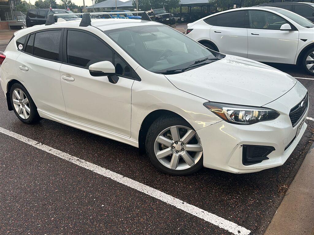 Crystal White Pearl 2019 Subaru Impreza Hatchback All-Wheel Drive Manual
