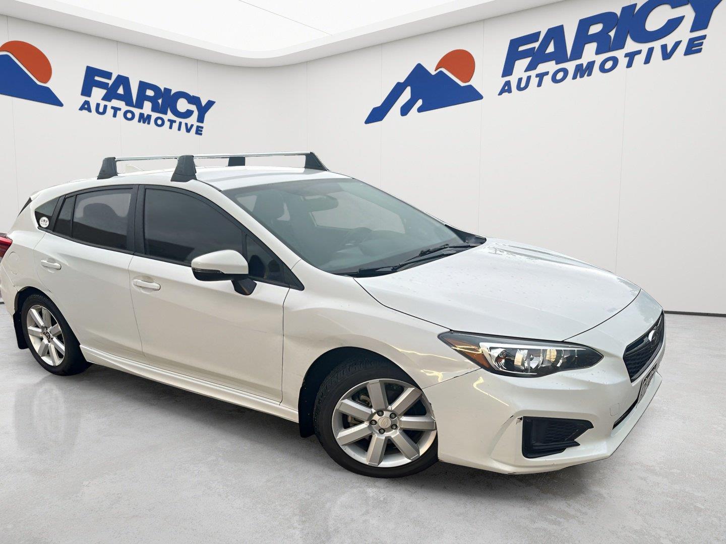 Crystal White Pearl 2019 Subaru Impreza Hatchback All-Wheel Drive Manual
