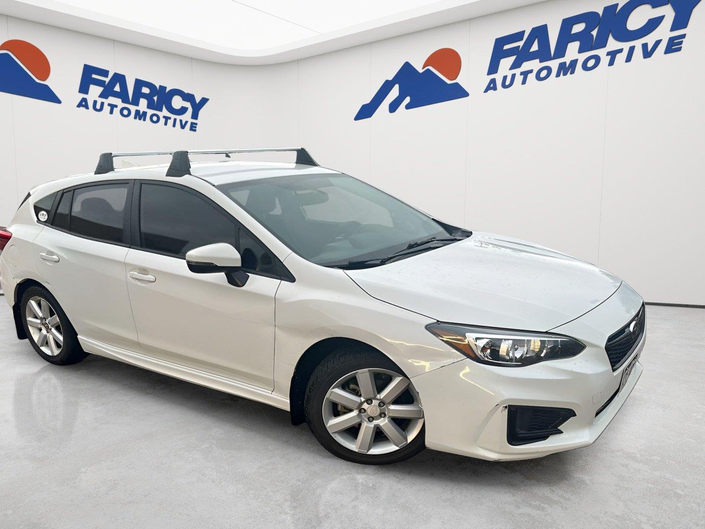 Crystal White Pearl 2019 Subaru Impreza Hatchback All-Wheel Drive Manual