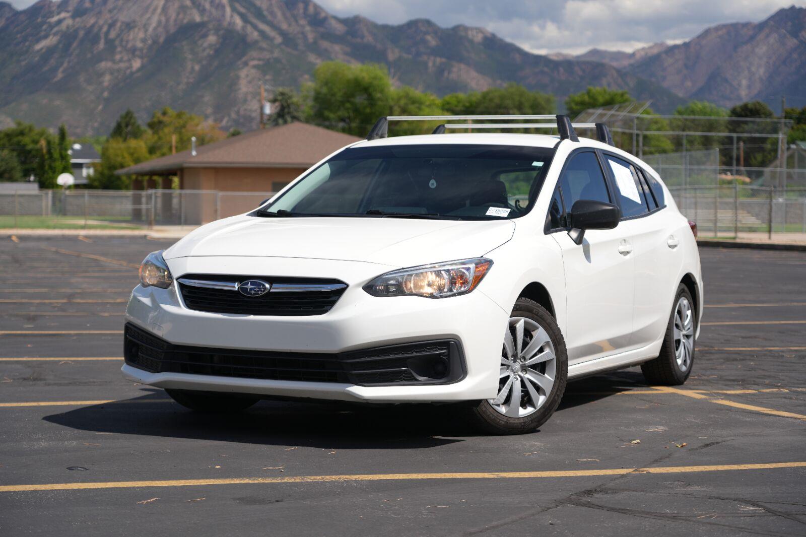 Crystal White Pearl 2023 Subaru Impreza Wagon All-Wheel Drive Manual