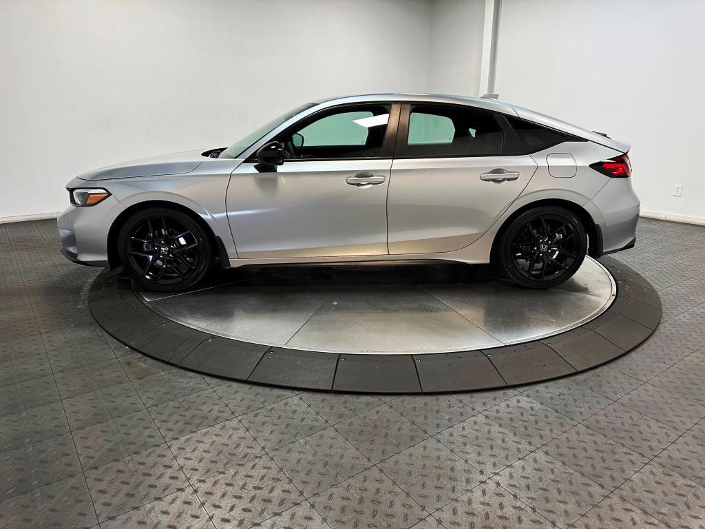 2026 Honda Civic Hatchback Sport - Solar Silver Metallic exterior view 5