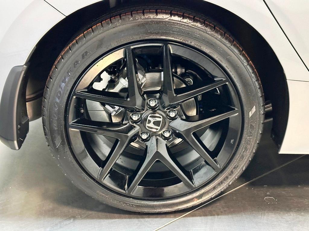 2026 Honda Civic Hatchback Sport - Solar Silver Metallic exterior view 10