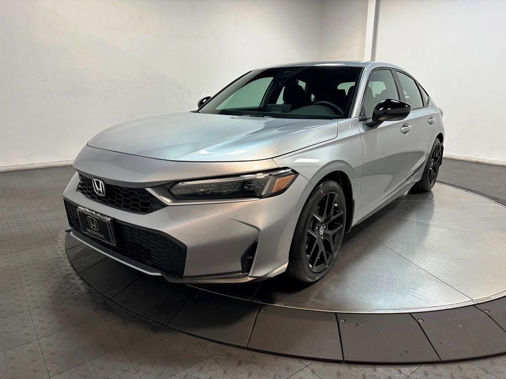 2026 Honda Civic Hatchback Sport - Solar Silver Metallic exterior view 4