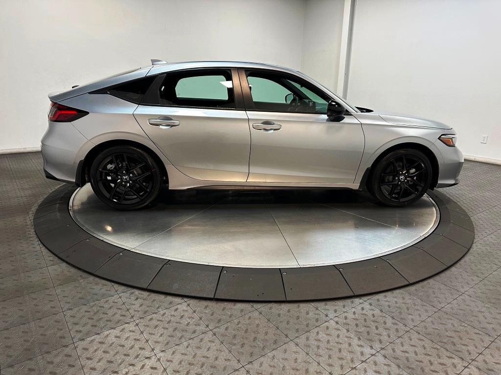 2026 Honda Civic Hatchback Sport - Solar Silver Metallic exterior view 9