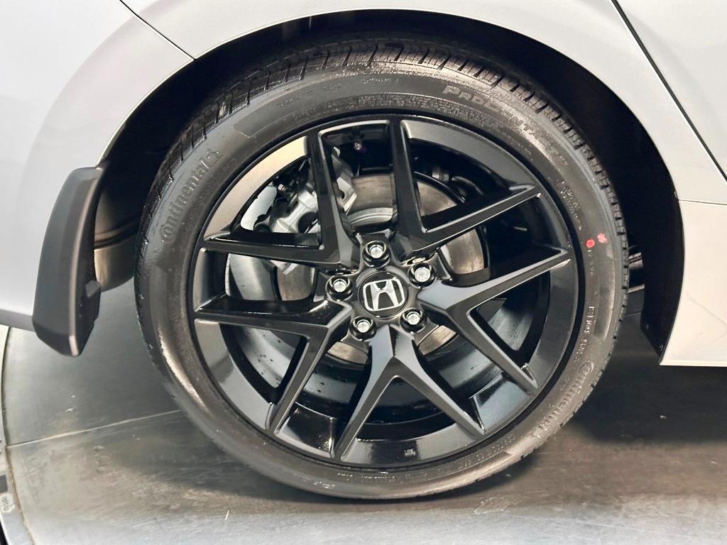 2026 Honda Civic Hatchback Sport - Solar Silver Metallic exterior view 10